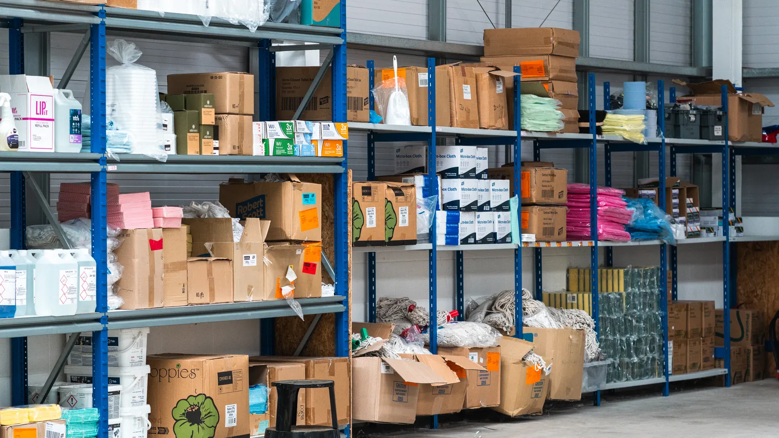 Cleaning products and consumables on shelving in Pristine warehouse